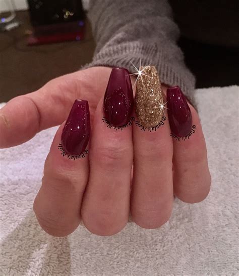 dark red nails with gold glitter|More.